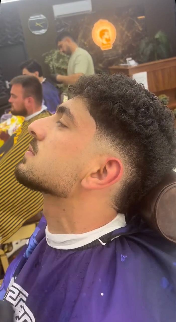 Allure Barber Geleen curly fade haircut